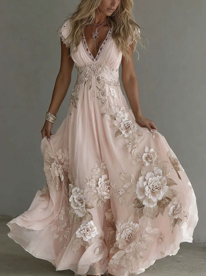 Women's pastel printed dress featuring elegant floral patterns in soft, flowing fabric and flattering neckline.