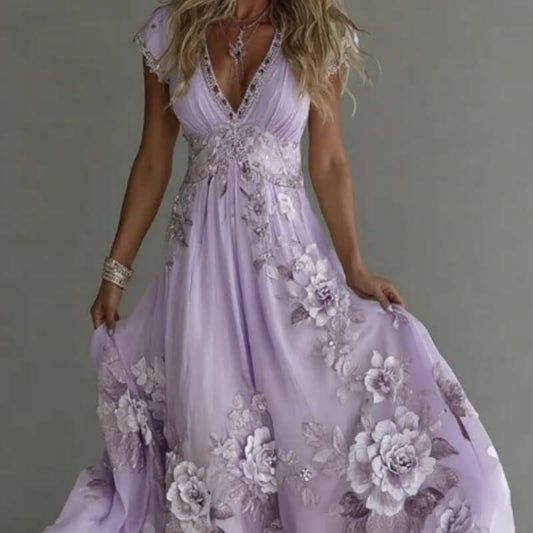 Women's pastel printed dress in soft lavender with floral design, perfect for summer occasions.