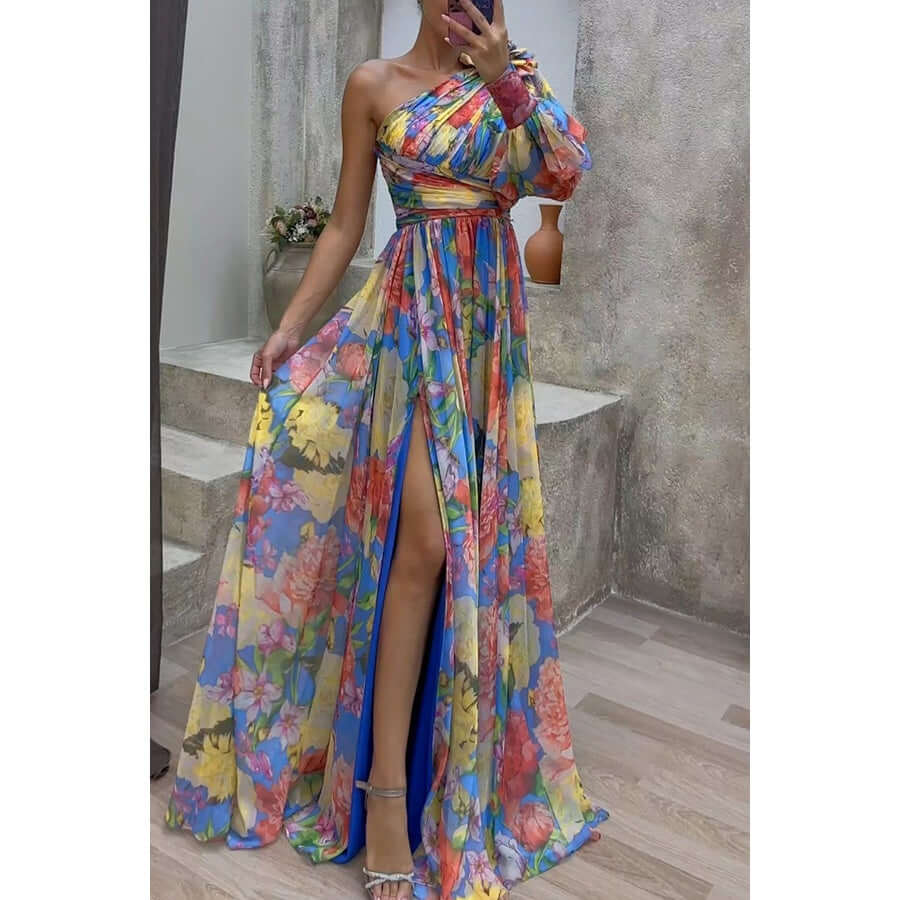 Floral print split maxi dress featuring a one-shoulder design and long sleeves, perfect for elegant evening events.