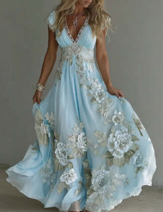 Women's pastel printed dress in light blue with floral design, perfect for effortless style.