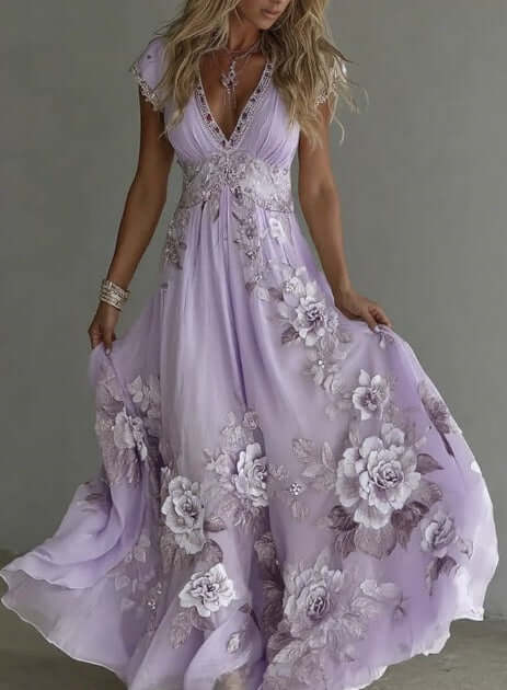 Women's pastel printed dress in soft lilac with floral design, flowing elegantly, perfect for stylish occasions.
